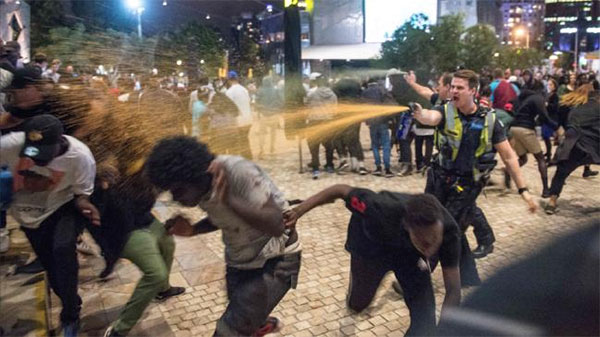police quell black riot