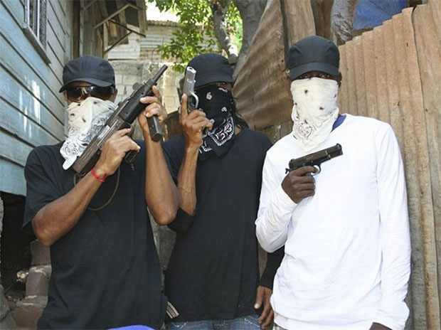 armed burglars in costume